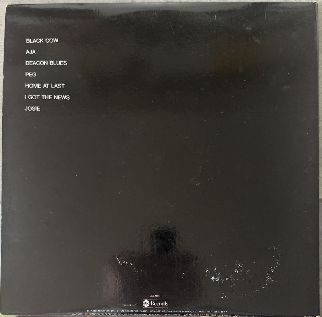 Steely Dan - Aja - 1977 repress used vinyl - VG+ / G+ - Early Pressing!
